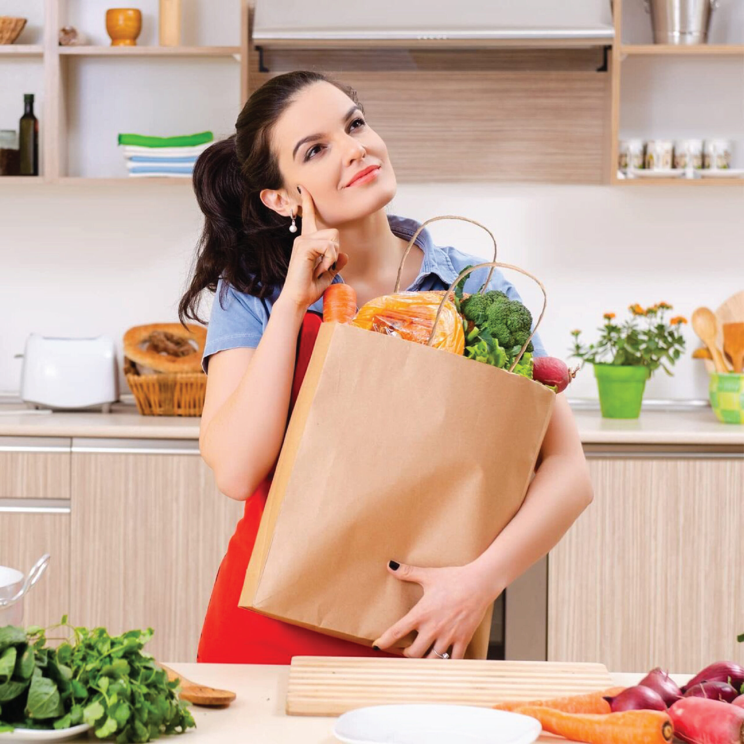 Brown kraft paper bags with strong handles for versatile packaging